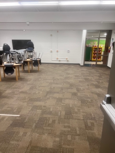 Commercial classroom carpet cleaned by Apex